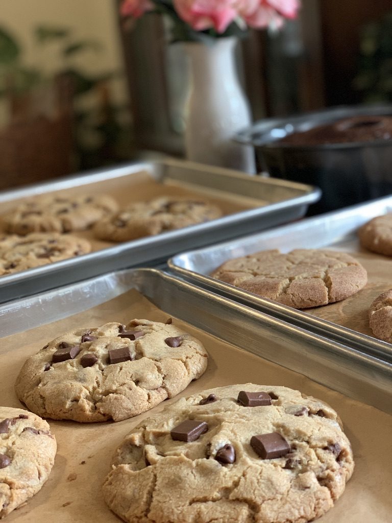 Trays of chocolate chunk cookies and snickerdoodles